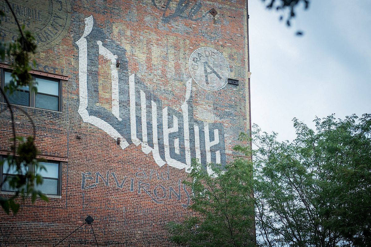 A brick building with the word 