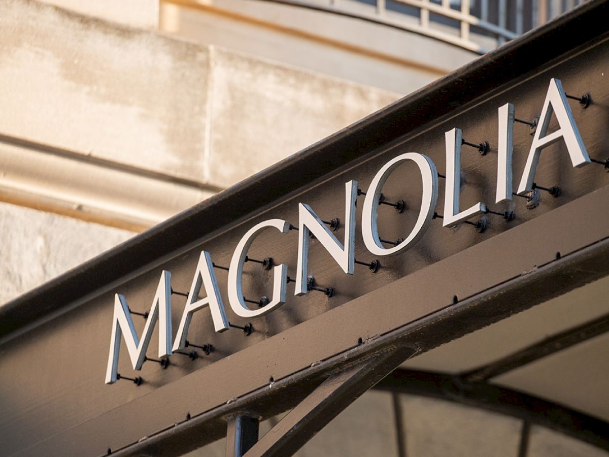 The image shows a sign with the word 