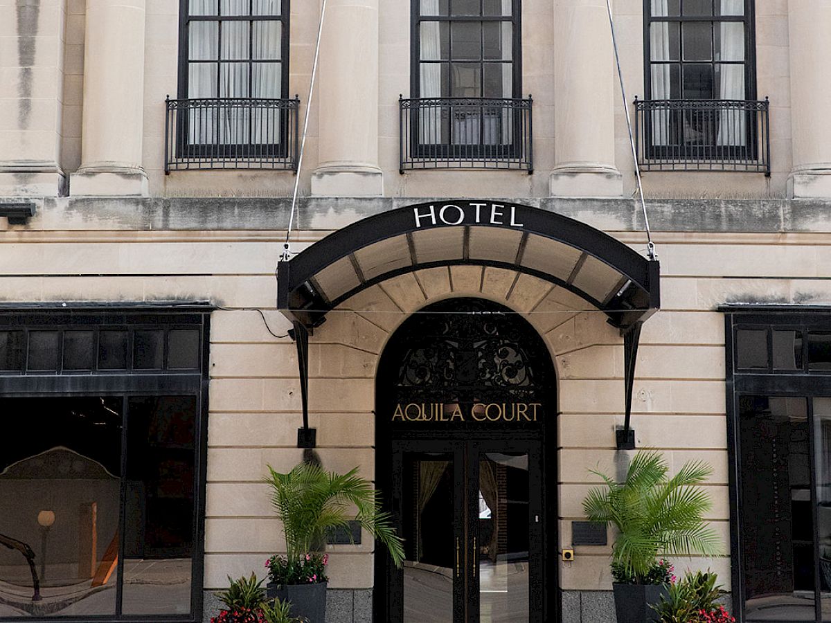 The image shows the facade of a building labeled 