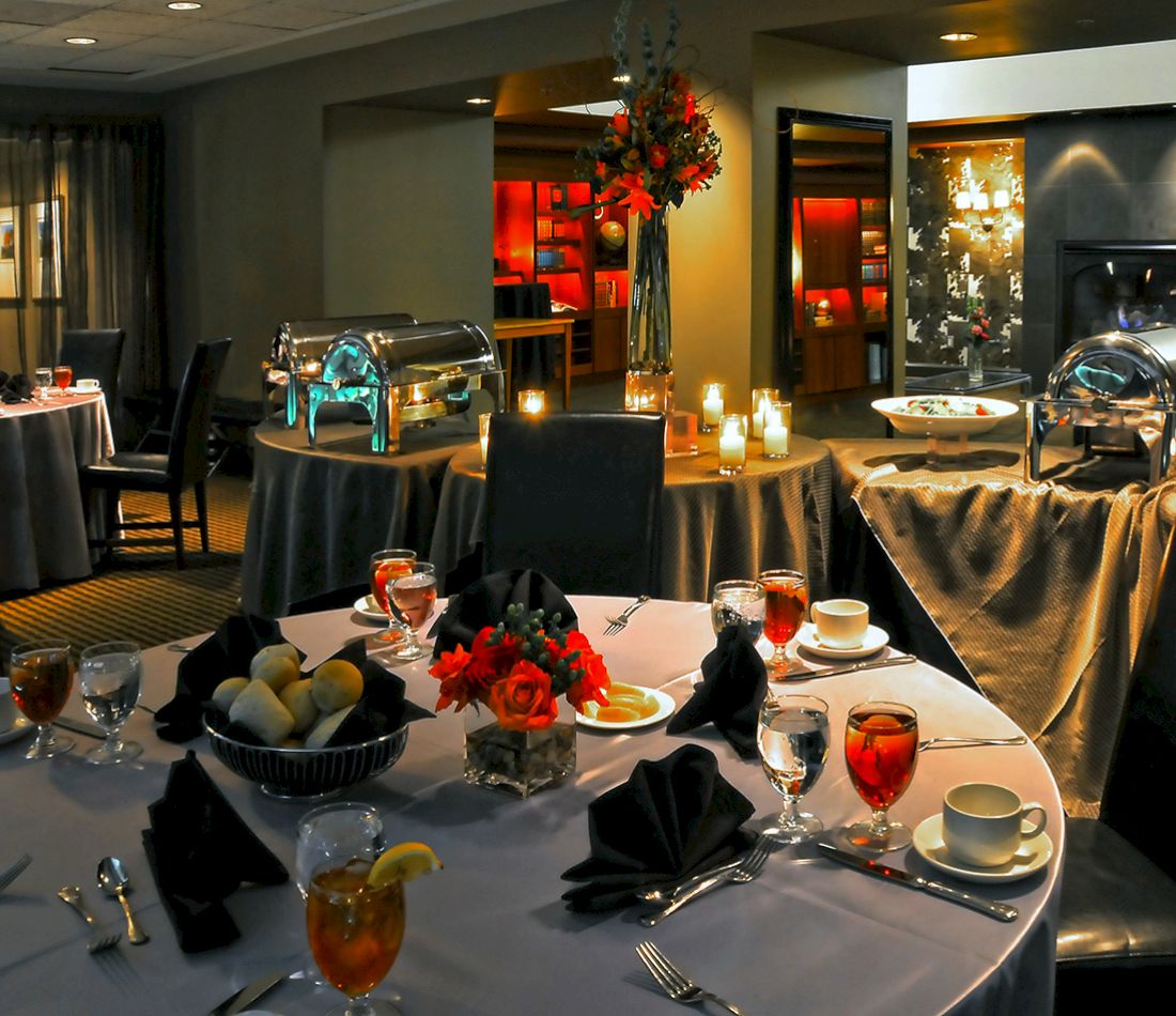 a dining room with tables set for a meal