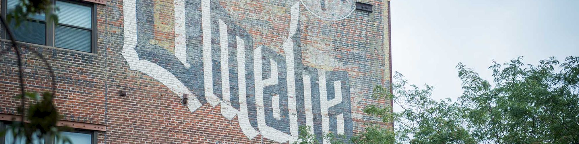 A brick wall features 